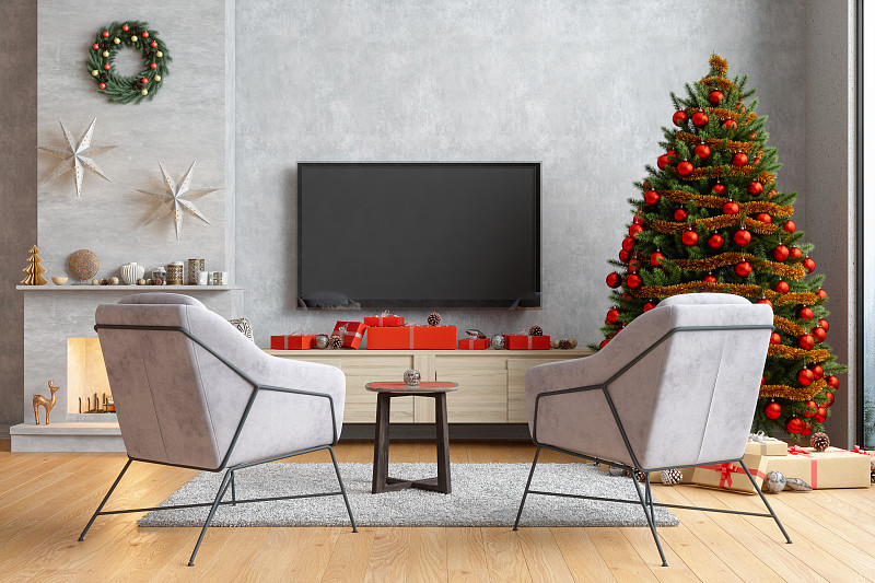 智能电视模型与空白屏幕在现代客厅扶手椅，圣诞树和礼品盒图片素材