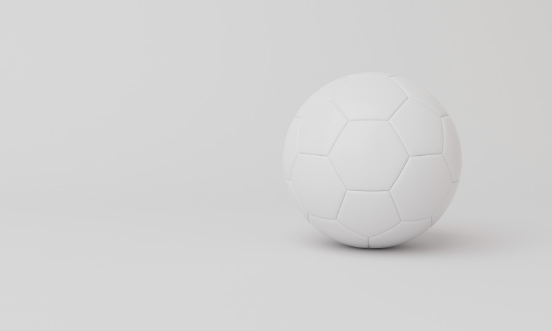 白色背景上的足球。图片下载