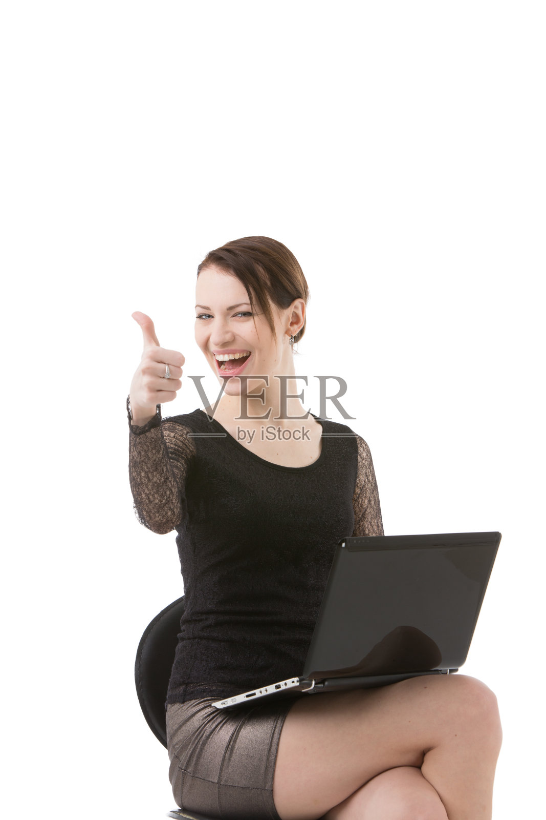 成功的女商人竖起大拇指照片摄影图片