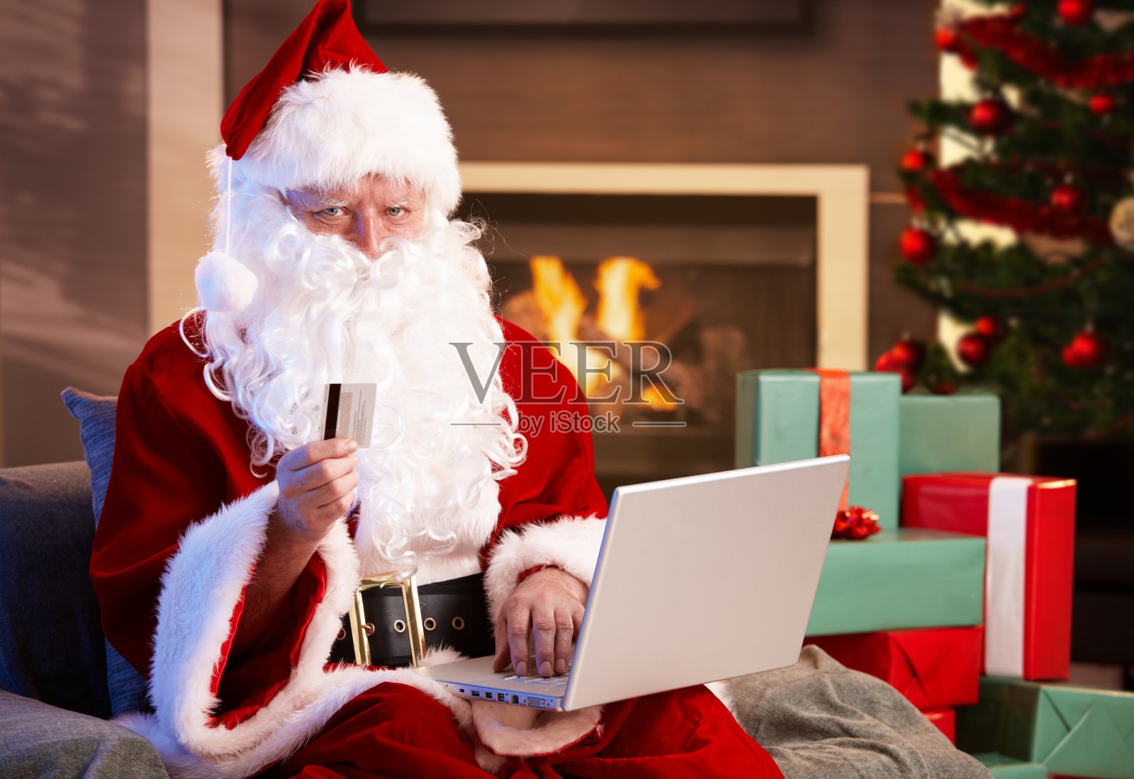 圣诞老人网上购物照片摄影图片