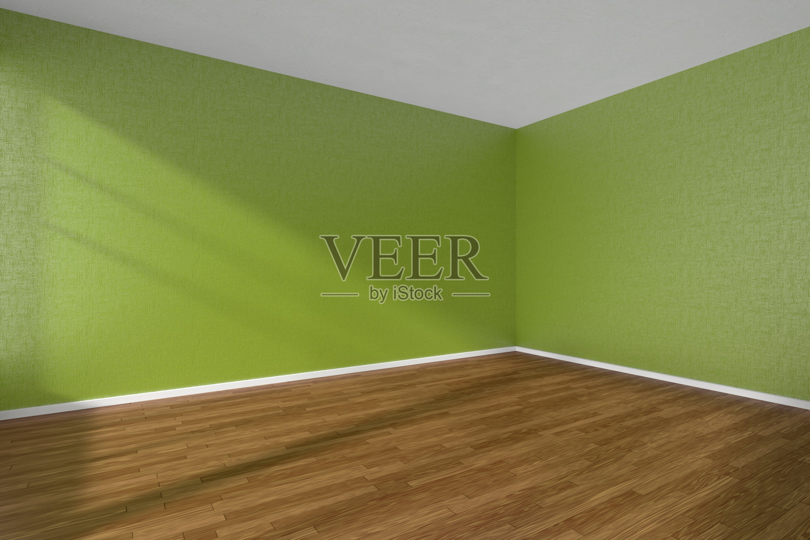 空房间，深色拼花地板和有纹理的绿色墙壁照片摄影图片