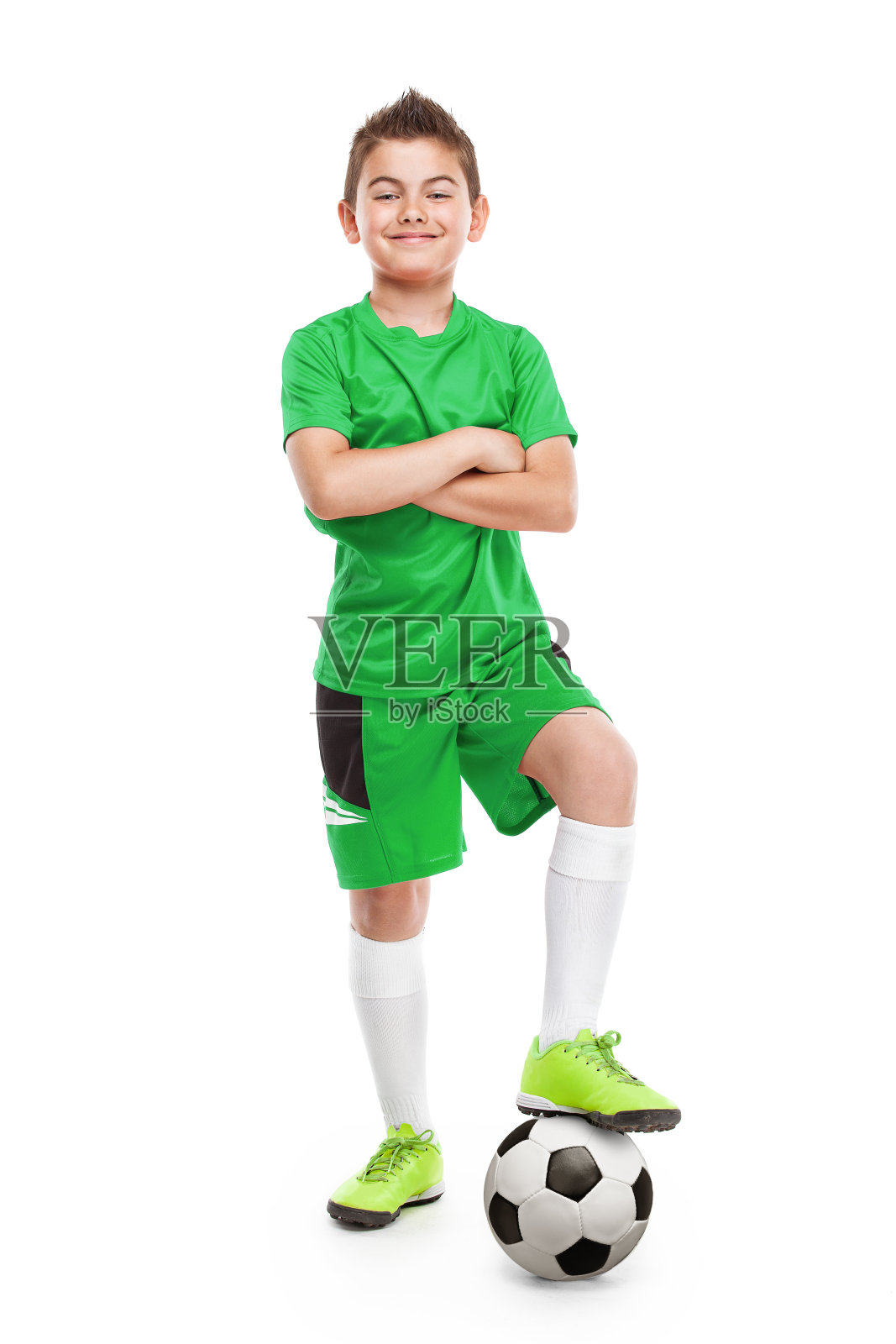 站着一个年轻的足球运动员照片摄影图片
