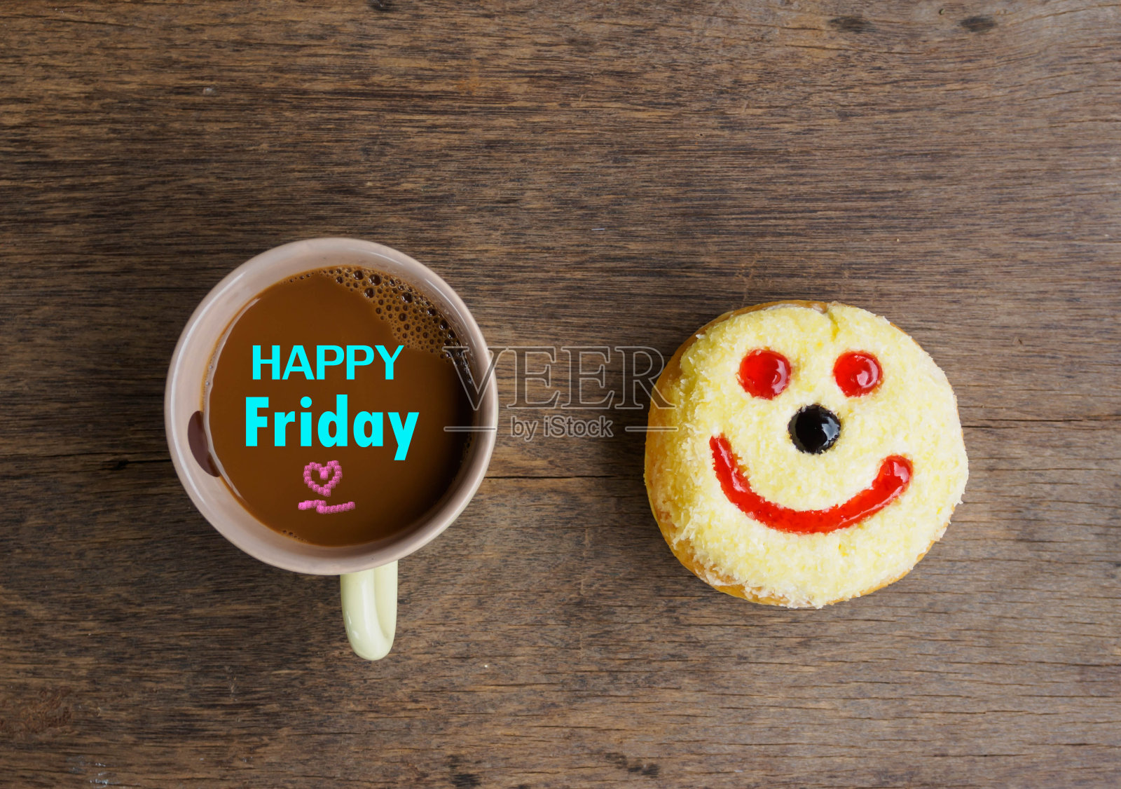 快乐星期五咖啡杯概念和甜甜圈甜蜜的微笑象征照片摄影图片