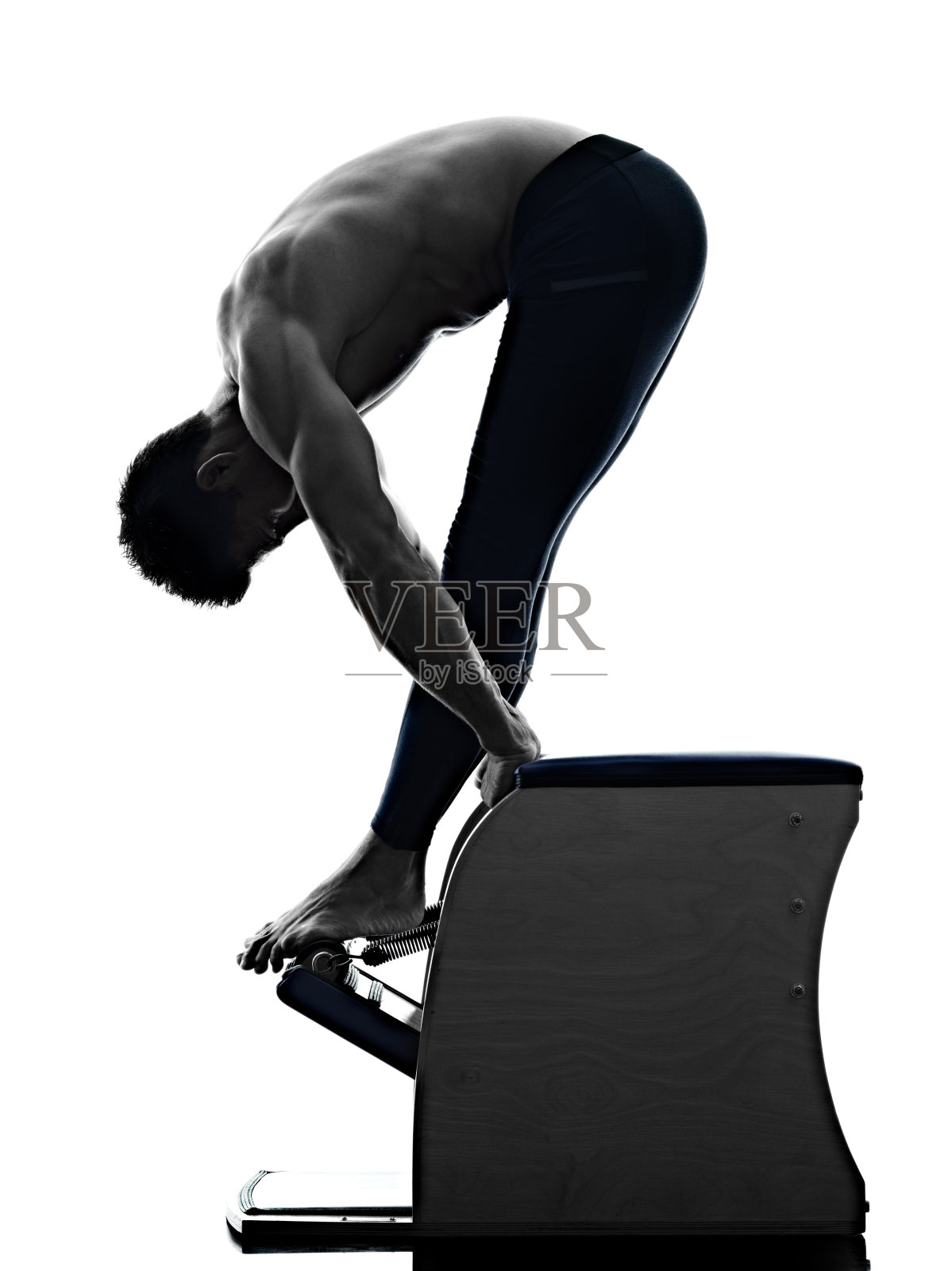 男人普拉提椅子锻炼健身孤立照片摄影图片
