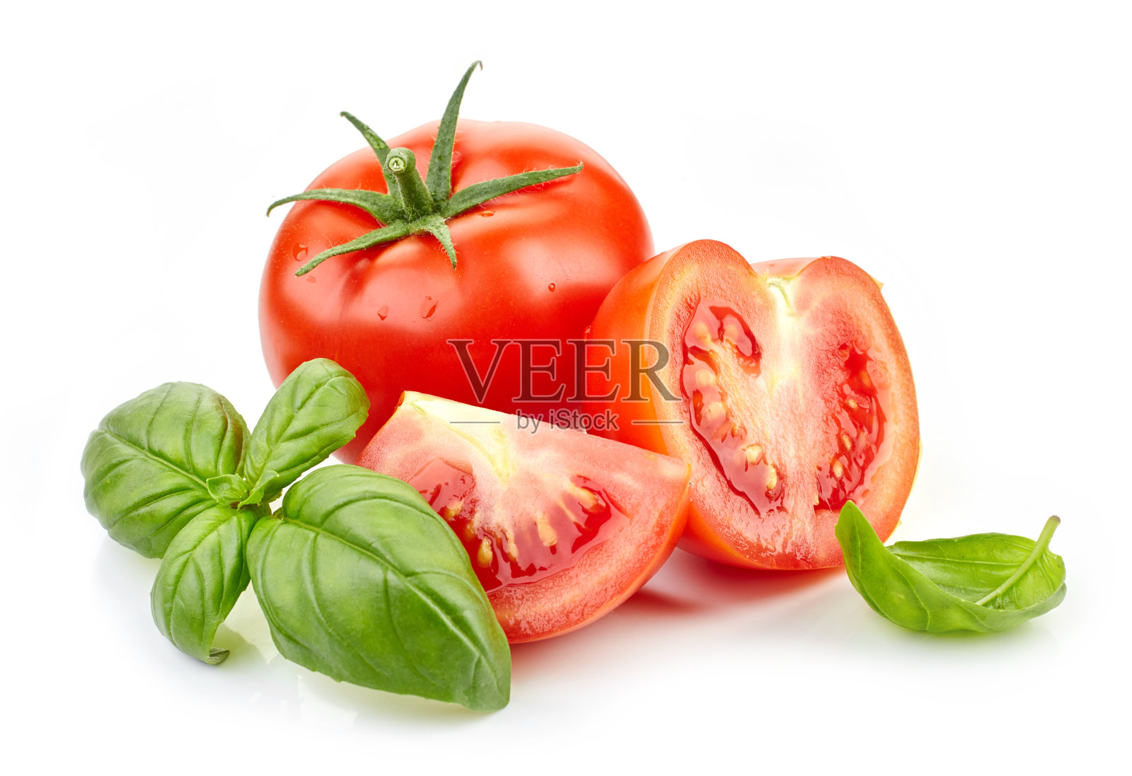 新鲜的西红柿和罗勒叶照片摄影图片