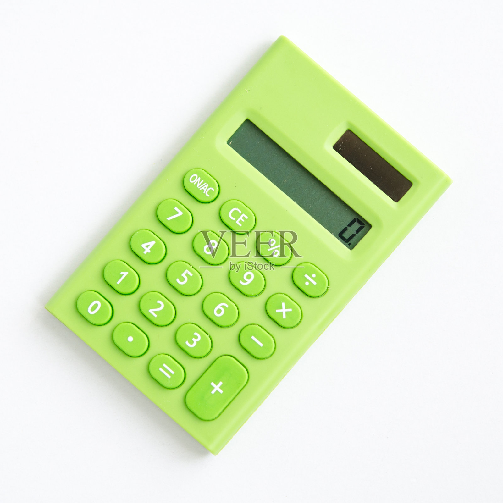 绿色可爱的计算器在白色的背景照片摄影图片