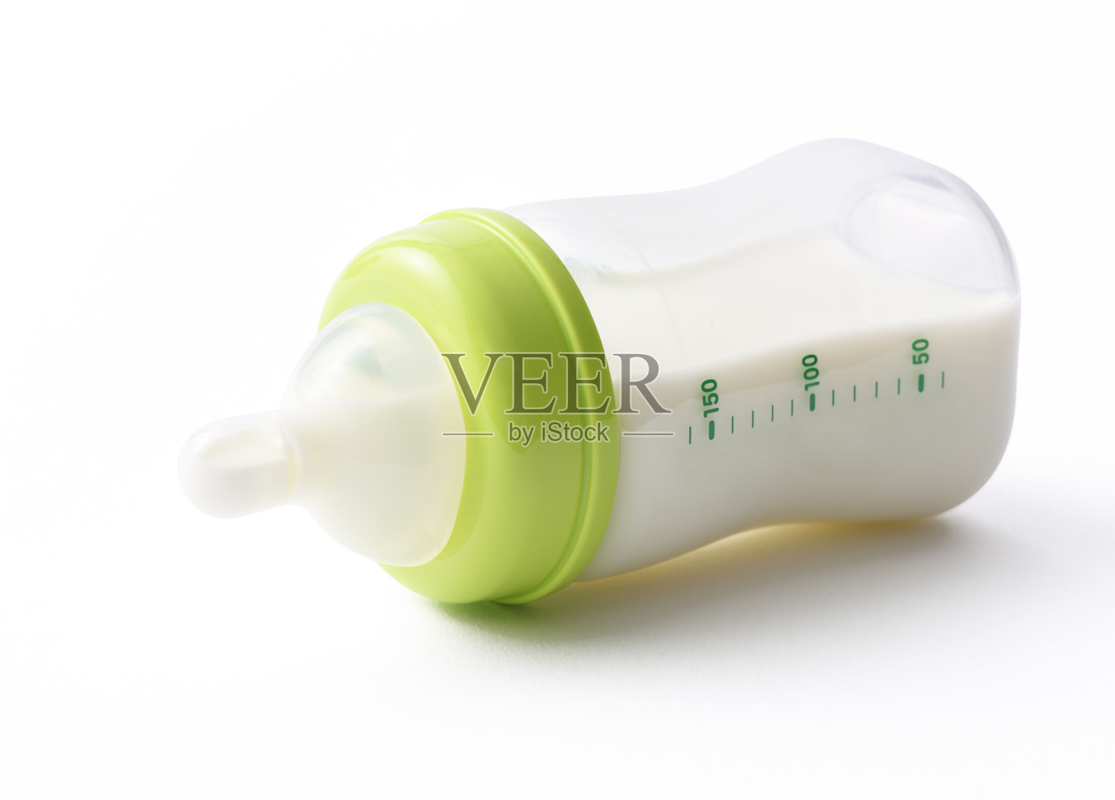 白色背景上婴儿奶瓶的孤立镜头照片摄影图片