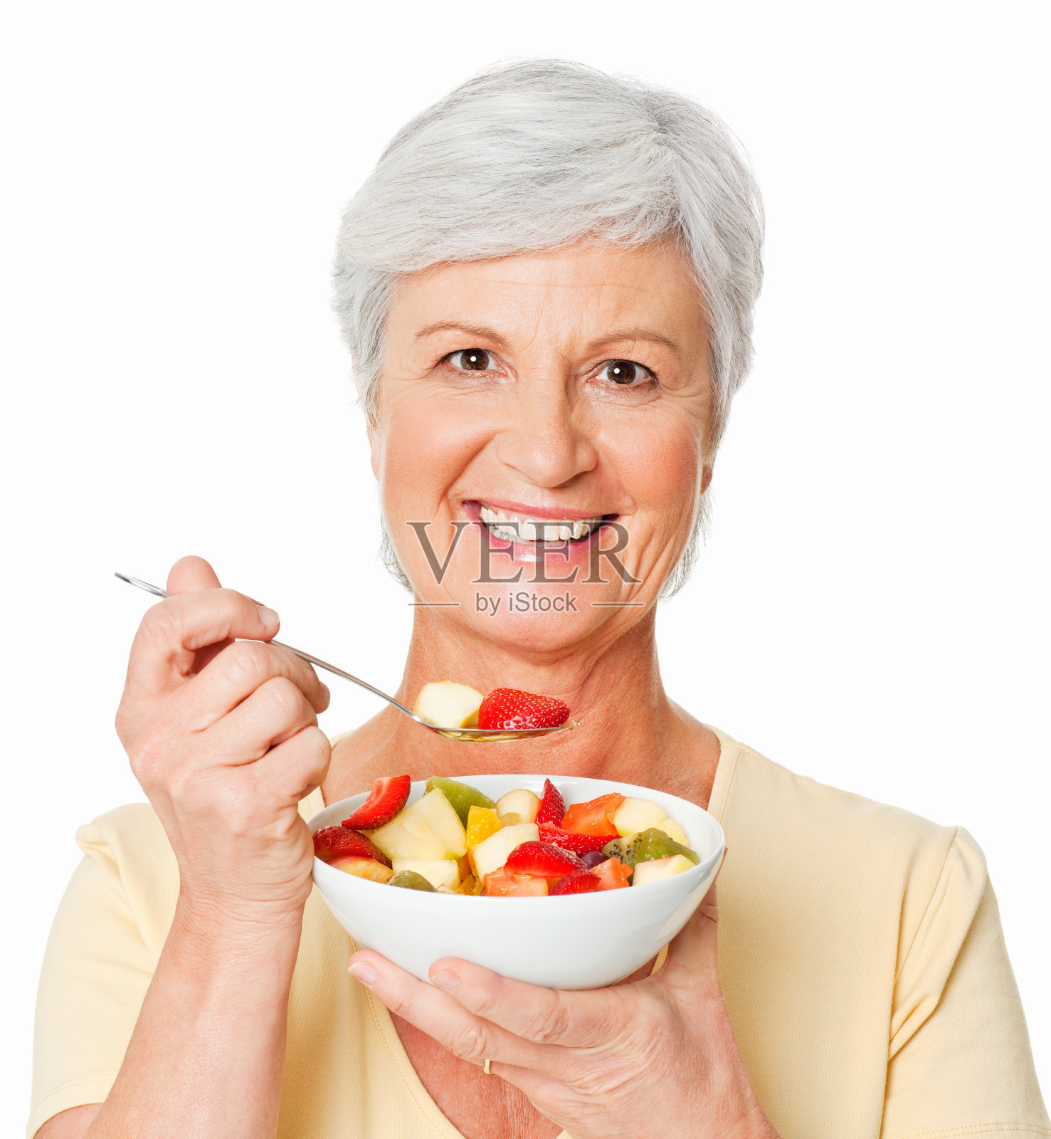 老女人吃水果-孤立照片摄影图片