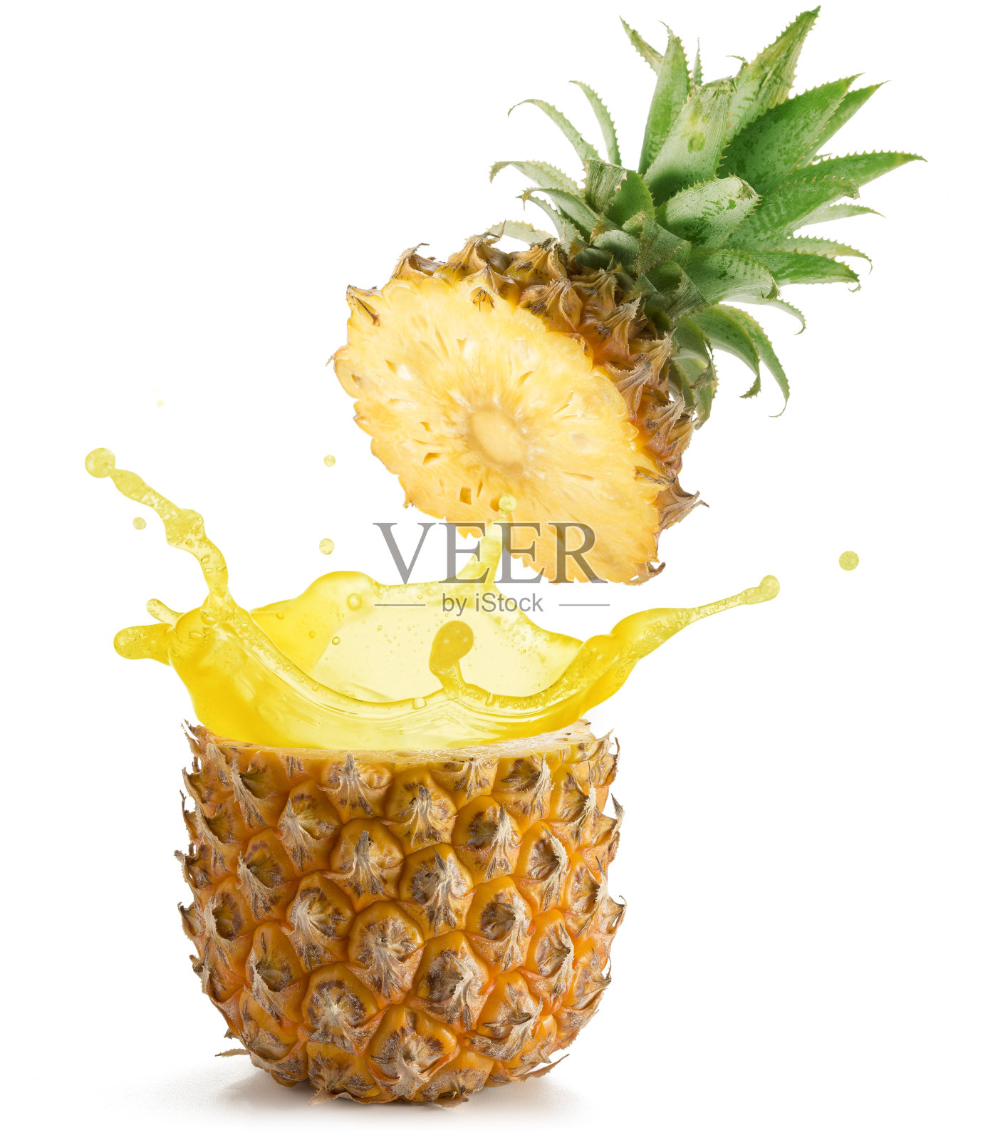 果汁从菠萝中溅出来照片摄影图片