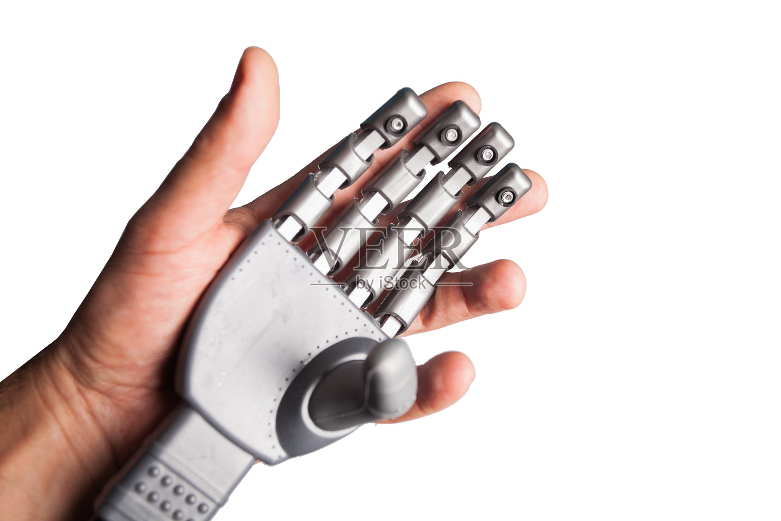 人类的手握着机器人的手照片摄影图片