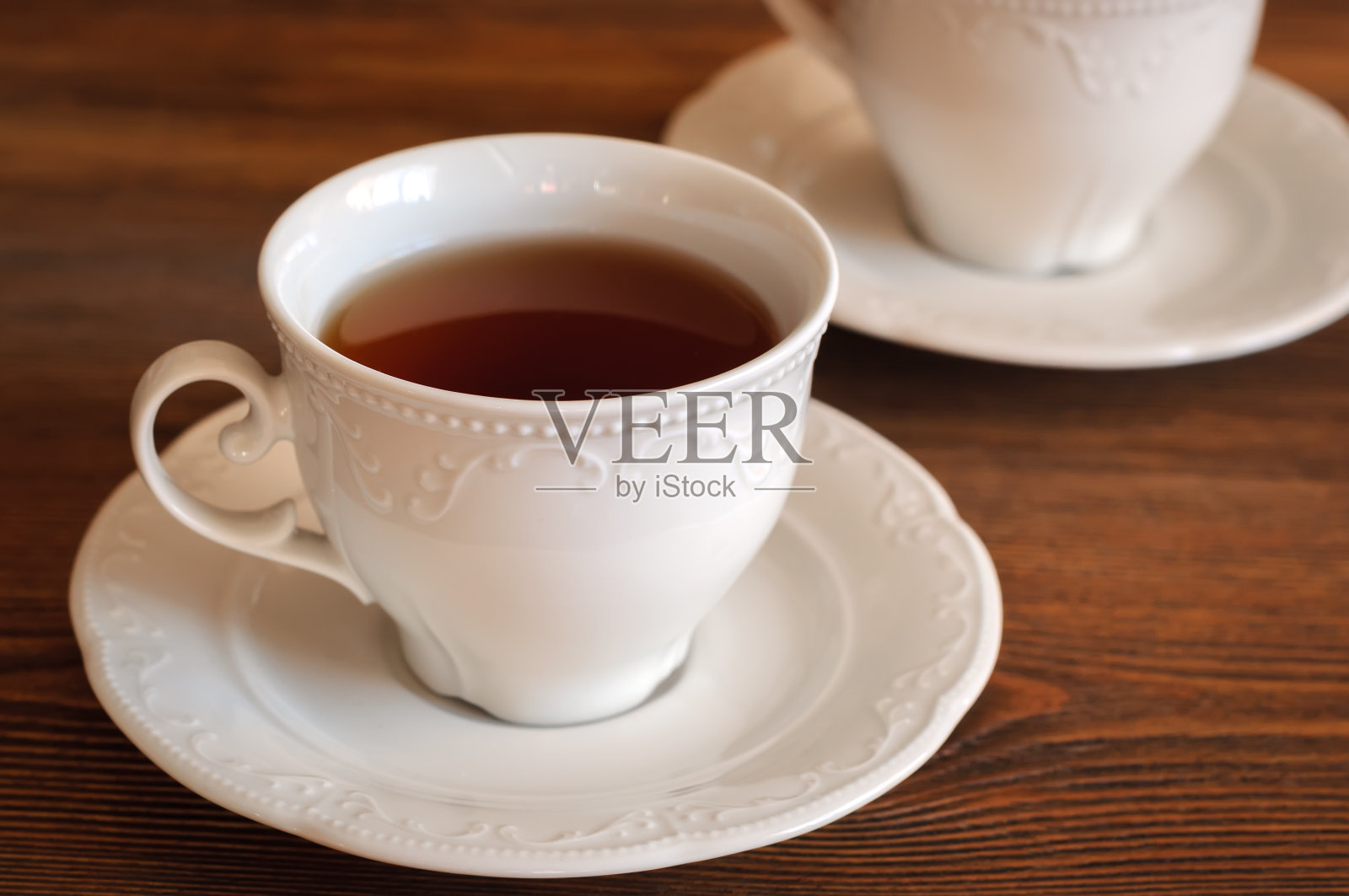 优雅的茶杯中的茶照片摄影图片