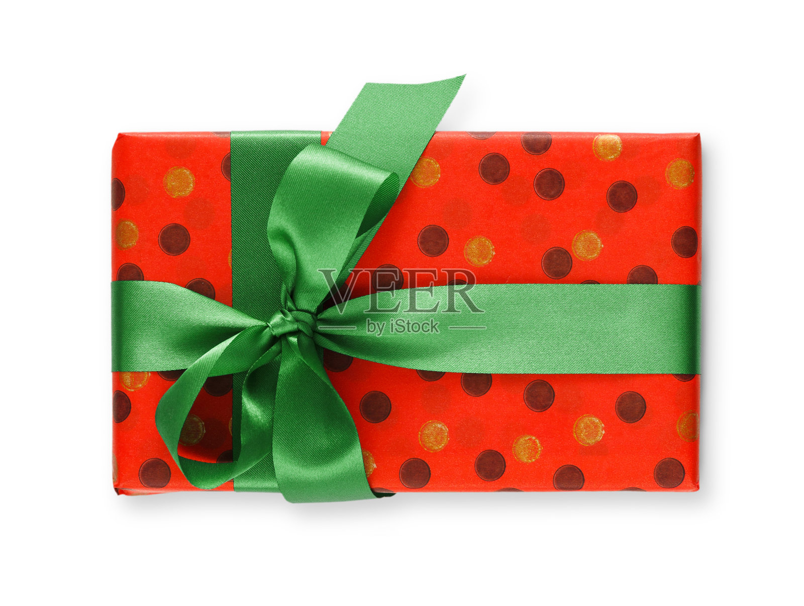 用红纸盒和绿丝带包装的礼盒照片摄影图片