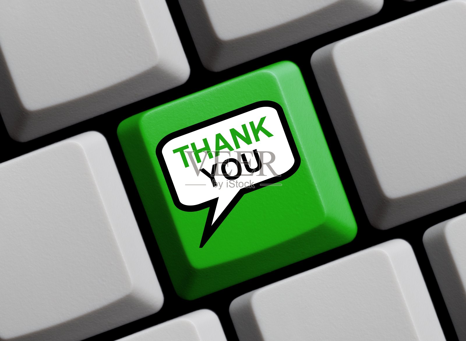 电脑键盘上显示“谢谢”的语音气泡照片摄影图片