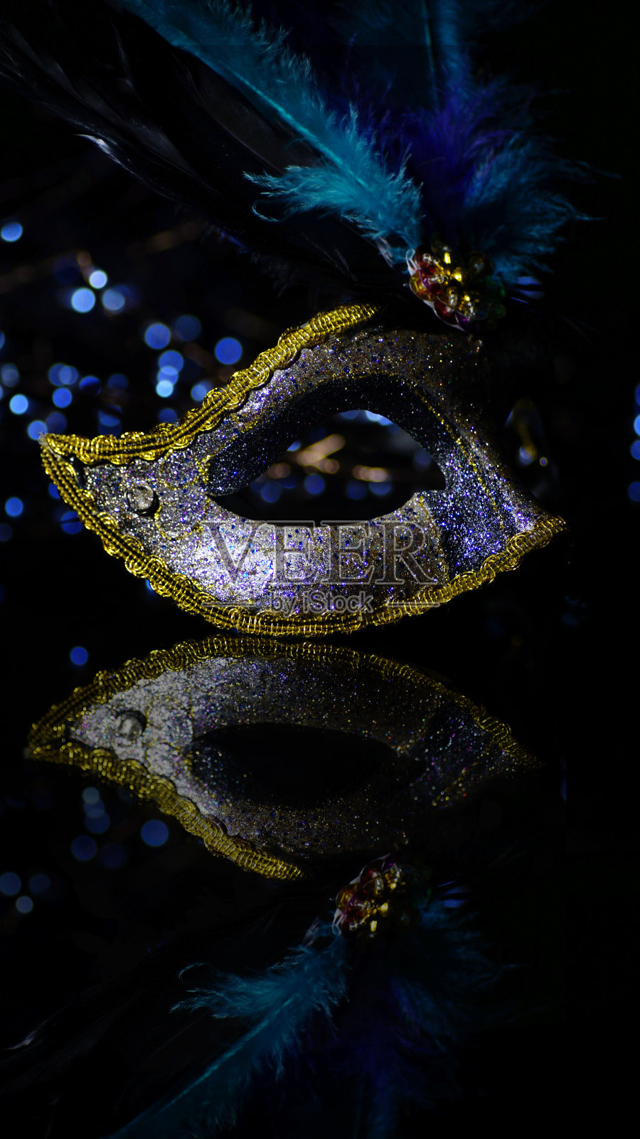威尼斯狂欢节面具，女性戏剧羽毛照片摄影图片
