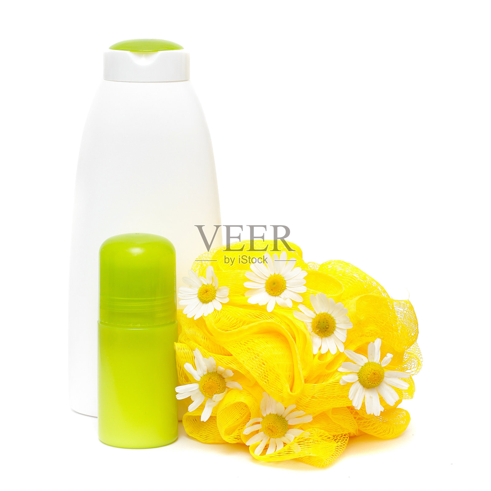 身体护理产品与雏菊隔离在一个白色的背景照片摄影图片