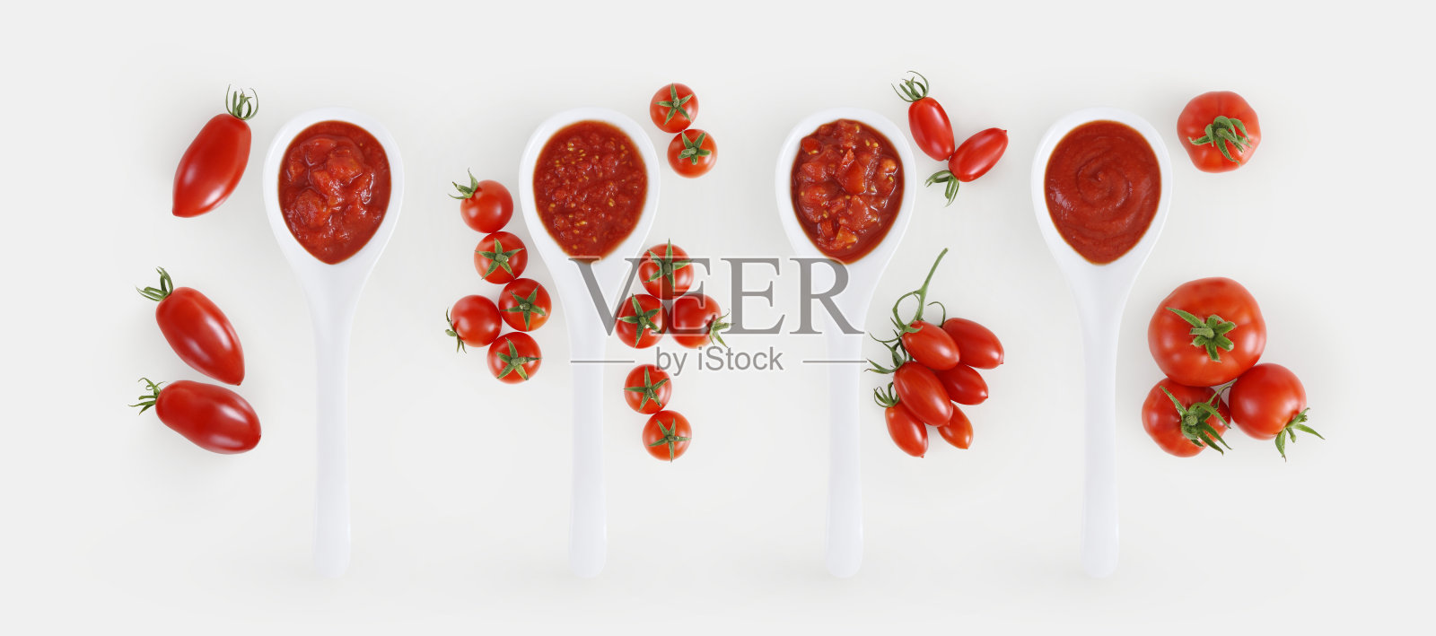 蕃茄酱匙，蕃茄和罗勒孤立在白色背景照片摄影图片