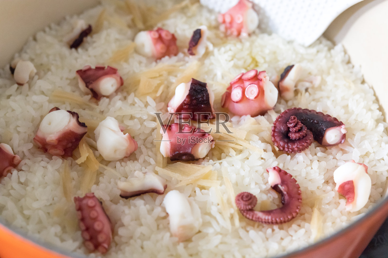 章鱼混合大米。照片摄影图片