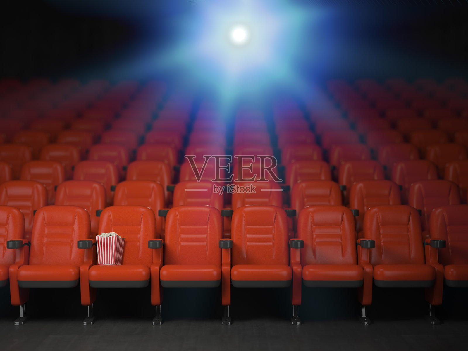 电影院和电影院的概念背景。一排排放着爆米花的红色空座位。照片摄影图片
