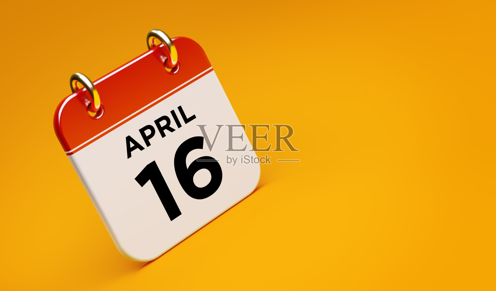 4月16日日历上的黄色背景照片摄影图片
