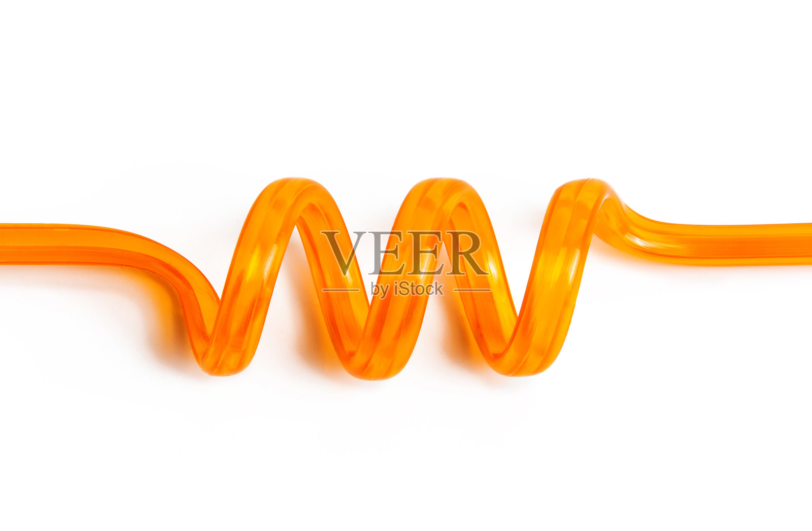 橙色螺旋吸管特写。照片摄影图片