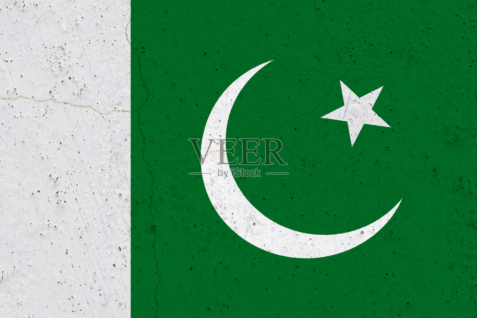 混凝土墙上挂着巴基斯坦国旗照片摄影图片