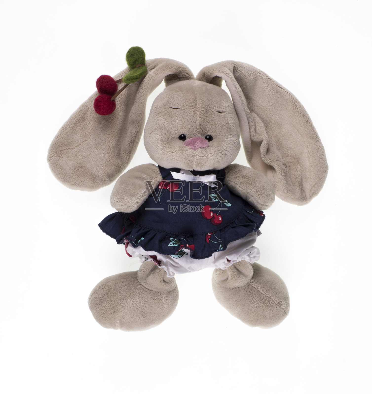 玩具长毛绒复活节兔子在一个白色的背景照片摄影图片