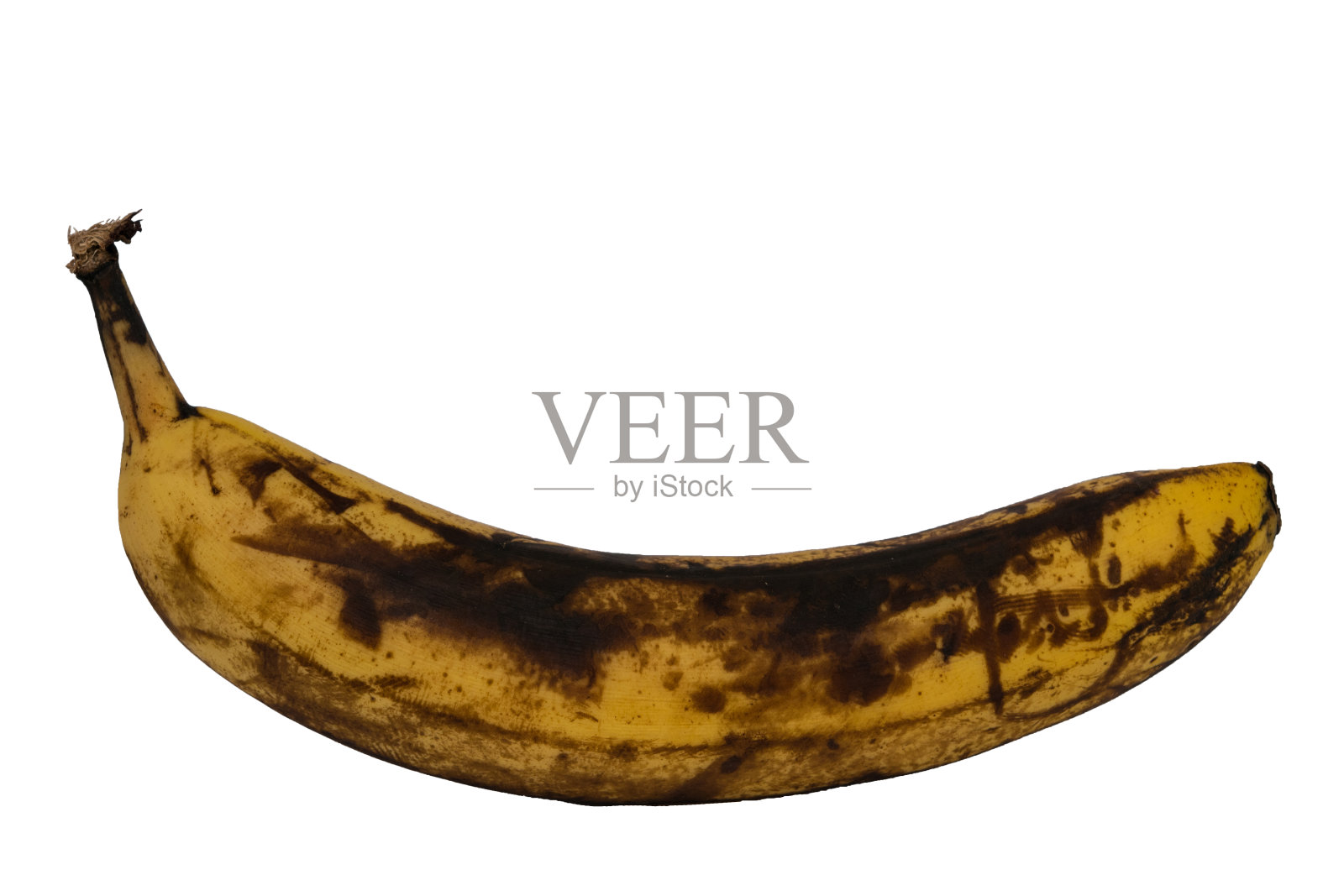 过熟的带黑的单一香蕉孤立在白色上照片摄影图片