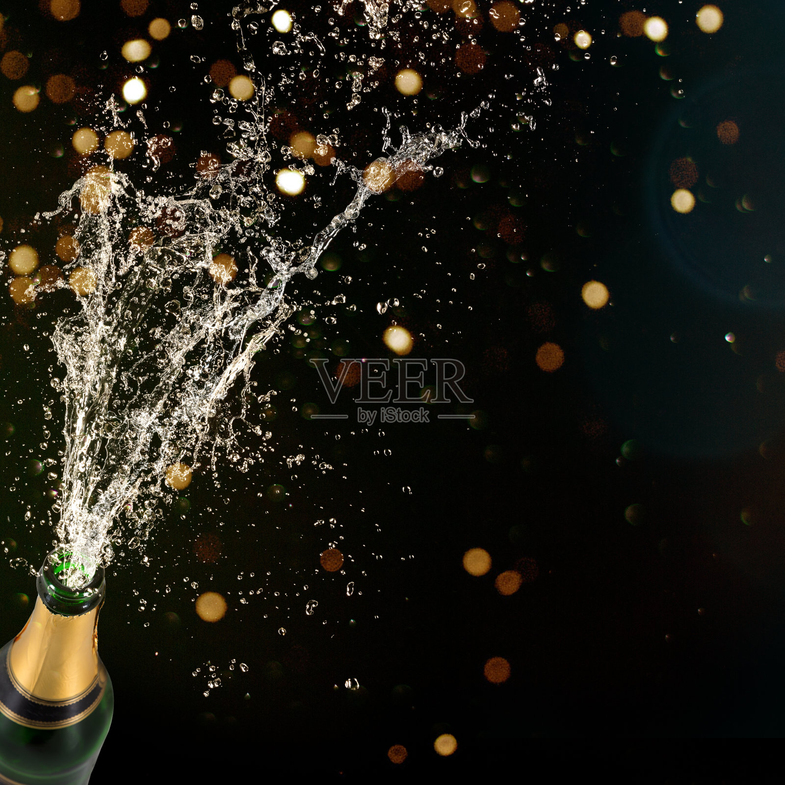 一瓶香槟酒，新年或其他庆祝主题。照片摄影图片