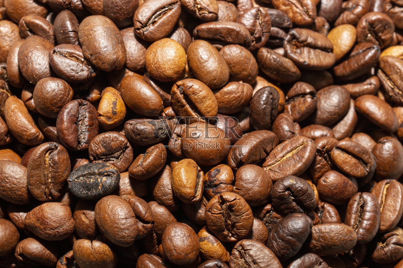 咖啡豆可以用机器煮了。照片摄影图片