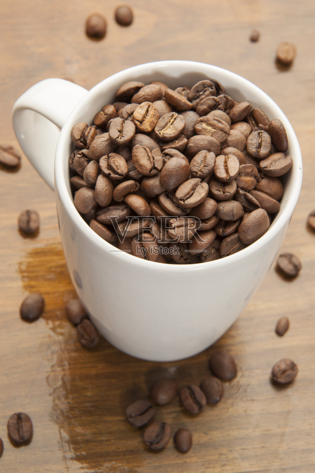 咖啡豆到咖啡杯的概念形象照片摄影图片