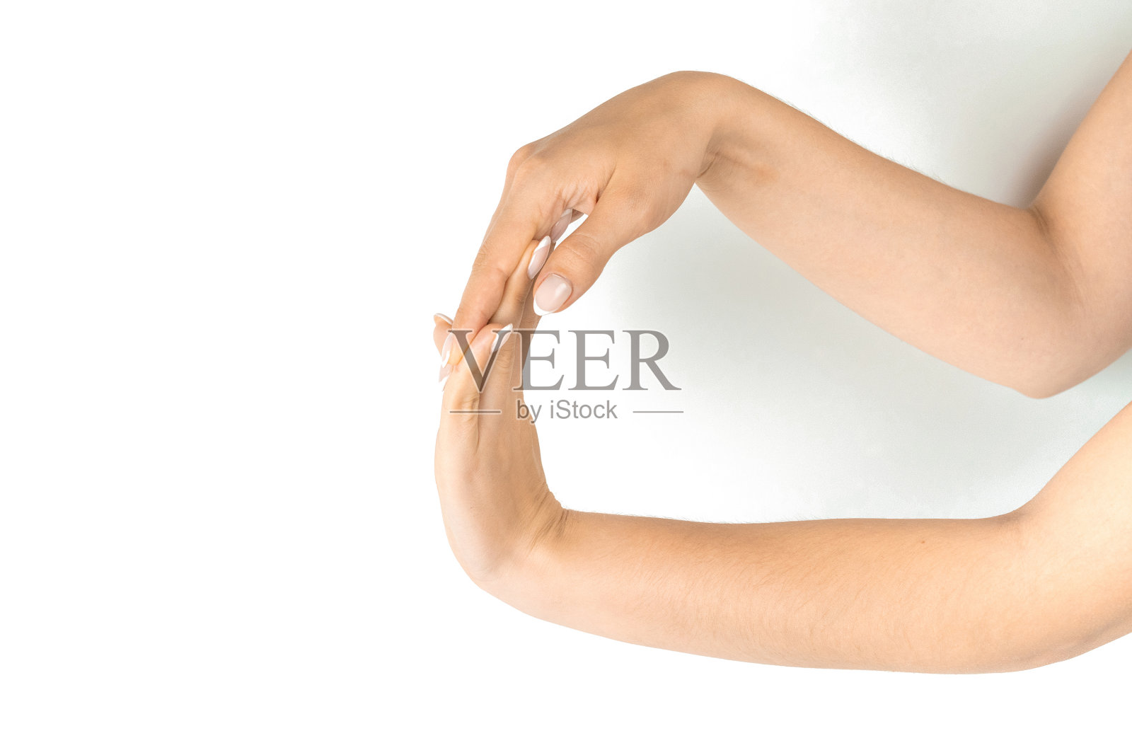 手指运动。女性手指充电，伸展疗法疼痛手腕保护孤立在白色背景。健康锻炼锻炼。女性手部按摩对腕管综合征的保护。照片摄影图片