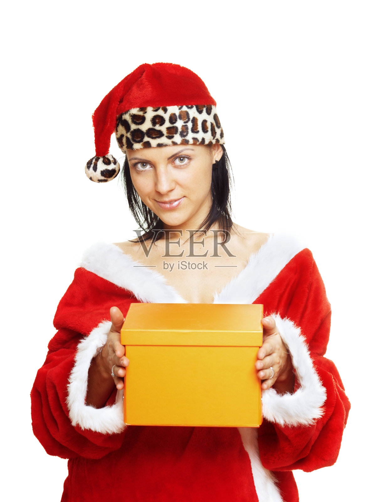 性感的女人在圣诞老人服装送礼物照片摄影图片