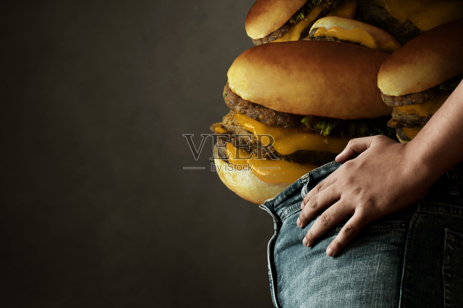 吃垃圾食品的胖子照片摄影图片