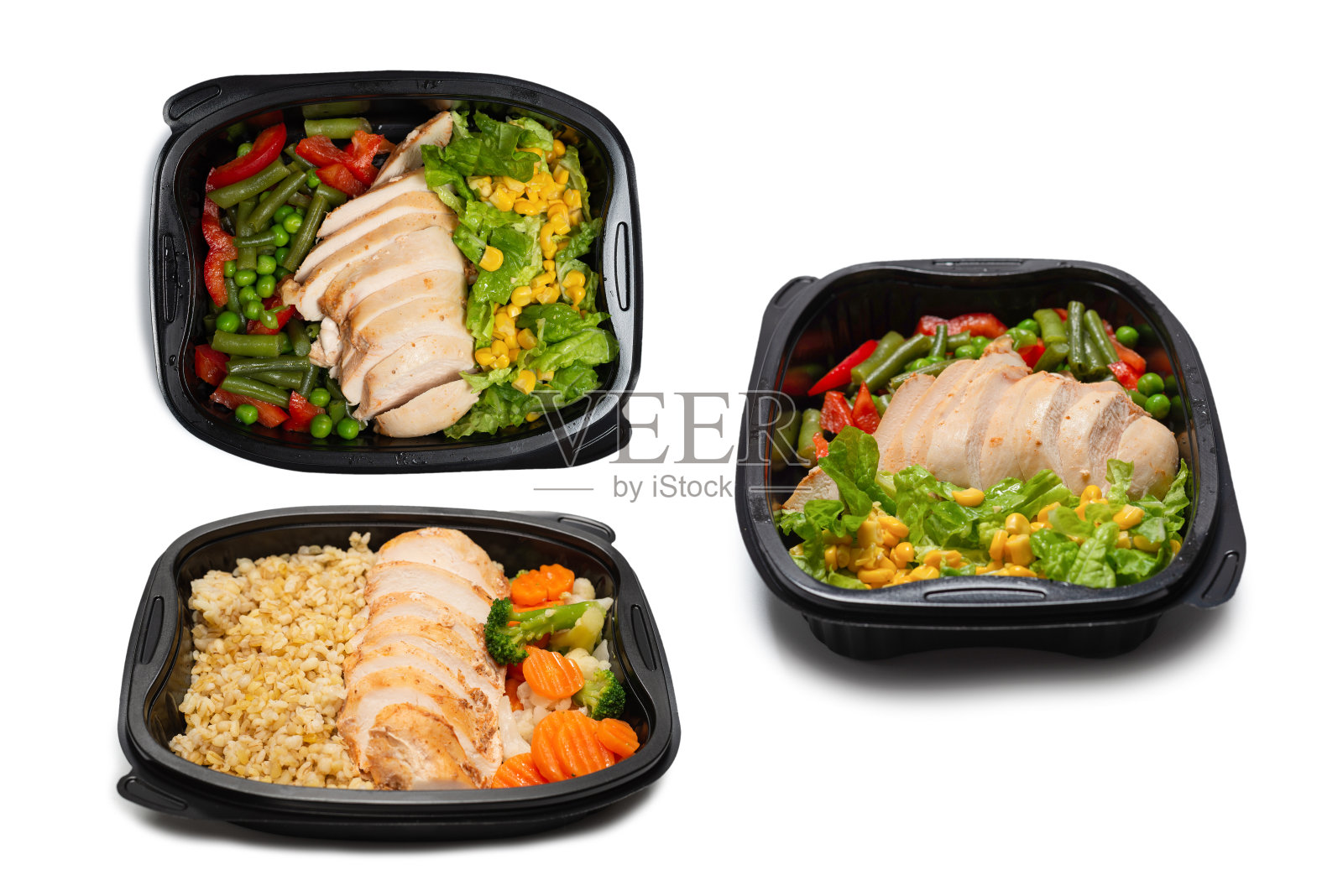 容器中的即食食品。炖鸡，炖蔬菜。照片摄影图片