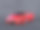 一辆红色豪华车停在黑暗的背景上素材图片