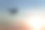 四轴飞行器在日出的背景下形成剪影素材图片