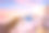 希腊圣托里尼岛蓝色圆顶教堂的日落景色素材图片