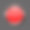红色圆形按钮上的金属穿孔背景素材图片