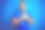 年轻英俊的男子穿着休闲t恤在蓝色孤立的背景微笑与手在胸前闭上眼睛和感激的手势在脸上。健康的概念。素材图片